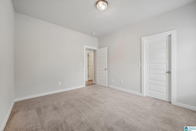 unfurnished bedroom with carpet floors