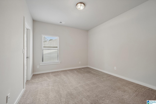 view of carpeted spare room