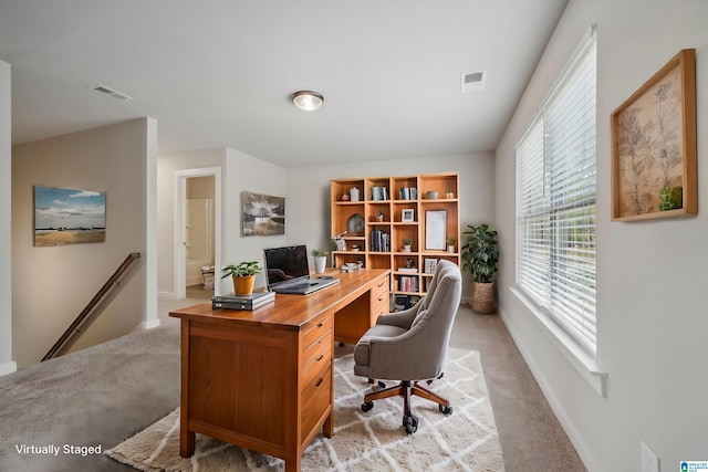 home office featuring light carpet