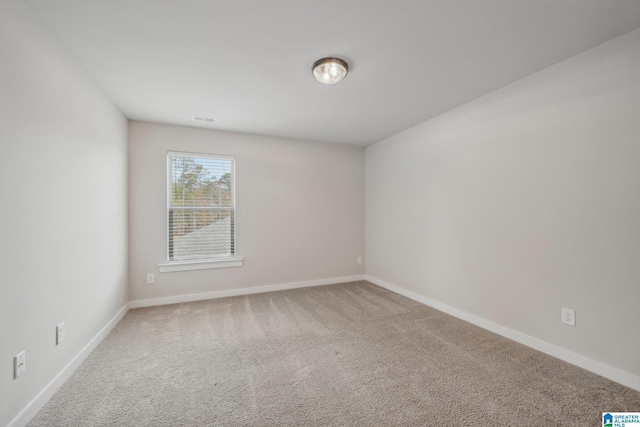 view of carpeted spare room