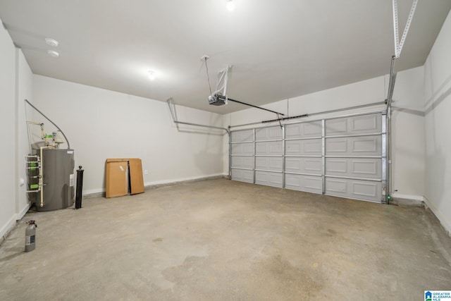 garage featuring water heater and a garage door opener