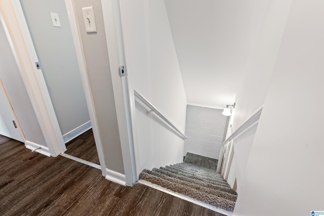 stairway with wood-type flooring