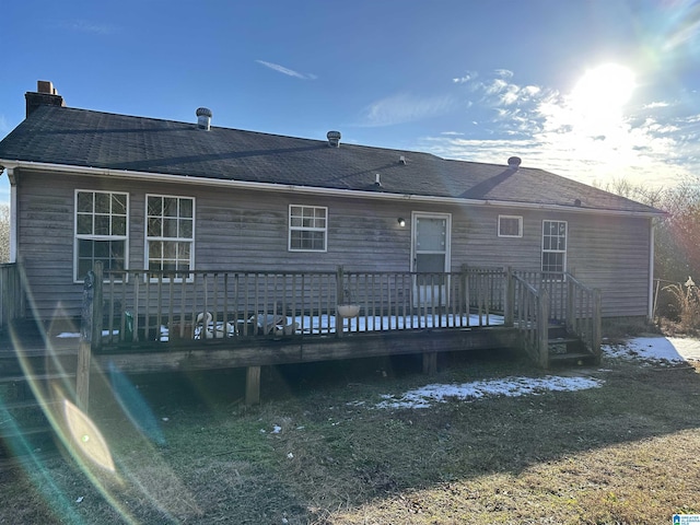 back of house featuring a deck