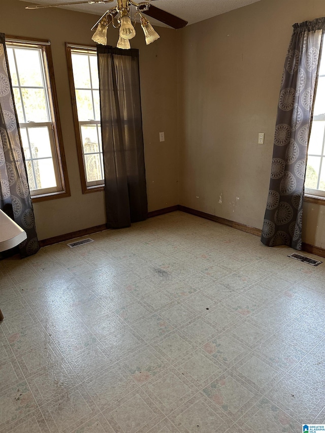 empty room with ceiling fan