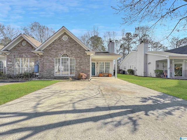 view of front of house featuring a front yard and a porch