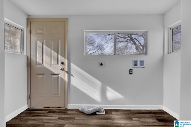 laundry area with electric dryer hookup, washer hookup, and dark hardwood / wood-style floors