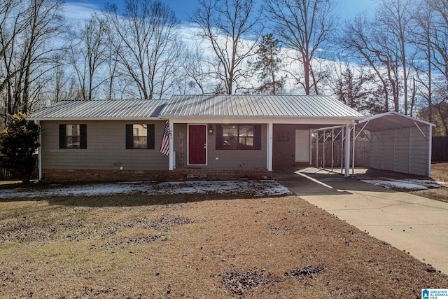 ranch-style house with a front yard and a carport