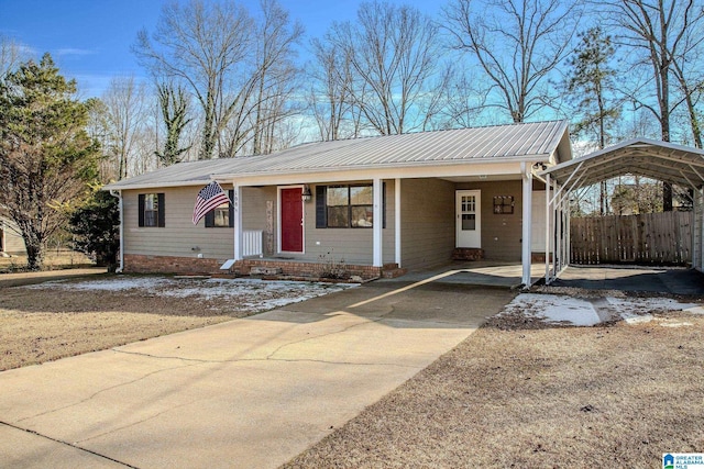 view of front of property with a carport