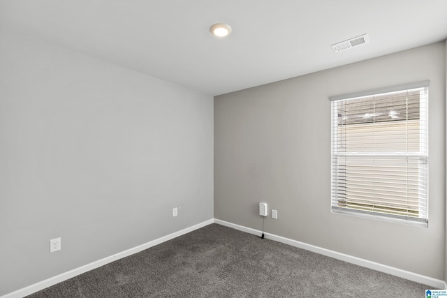 view of carpeted spare room