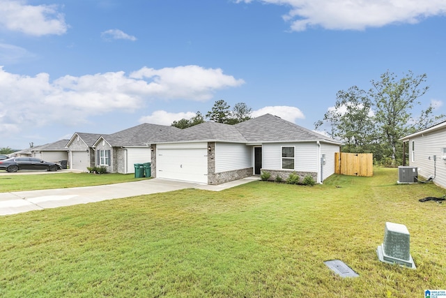 ranch-style house featuring a front yard, a garage, and cooling unit