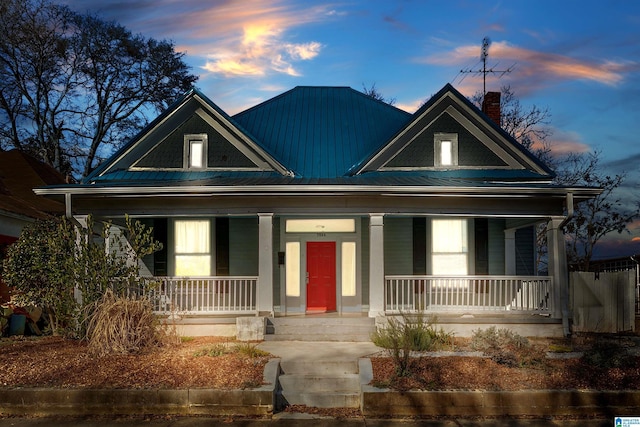 view of front of home featuring covered porch