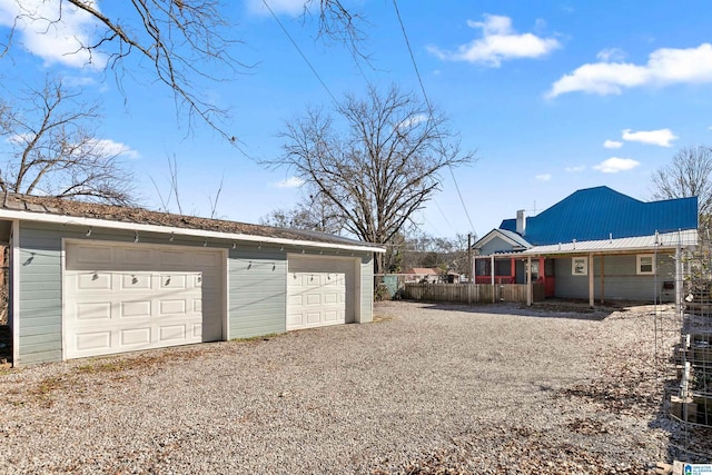 exterior space with a garage