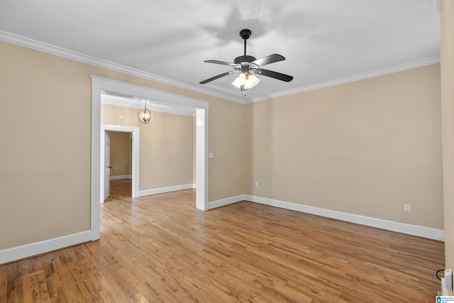 unfurnished room with light wood-type flooring, ceiling fan, and ornamental molding