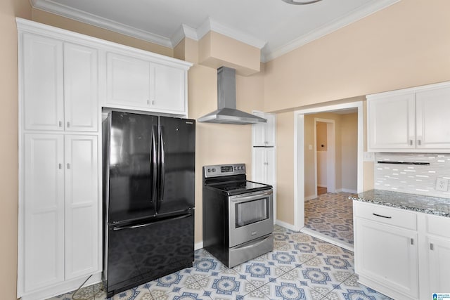 kitchen with wall chimney exhaust hood, black fridge, electric range, white cabinetry, and dark stone countertops