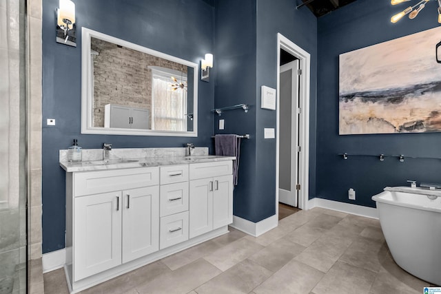 bathroom featuring ceiling fan, vanity, tile patterned floors, and a bath