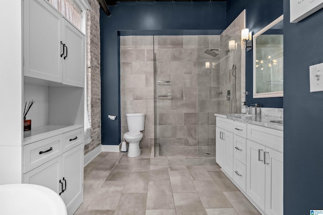 bathroom featuring vanity and a tile shower