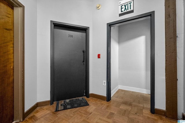 foyer featuring light parquet flooring