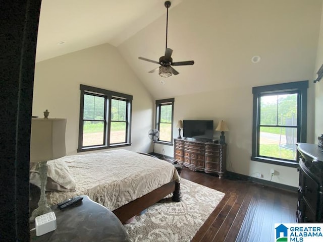 bedroom featuring lofted ceiling, ceiling fan, and dark hardwood / wood-style floors