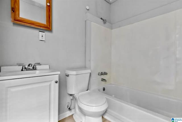 full bathroom featuring toilet, shower / washtub combination, and vanity