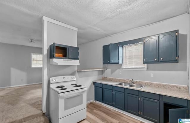 kitchen with white range with electric cooktop, blue cabinetry, a textured ceiling, and sink