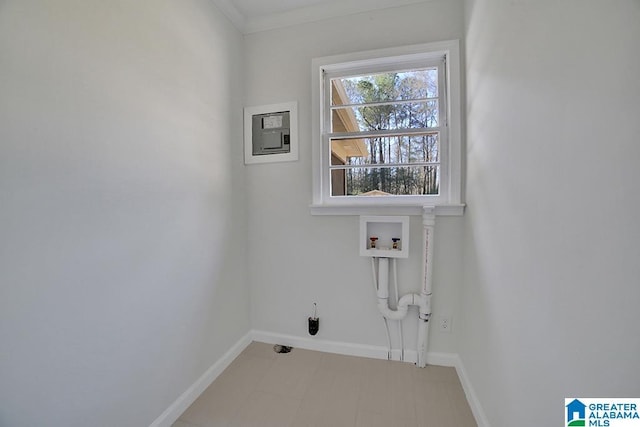 laundry area with washer hookup and crown molding