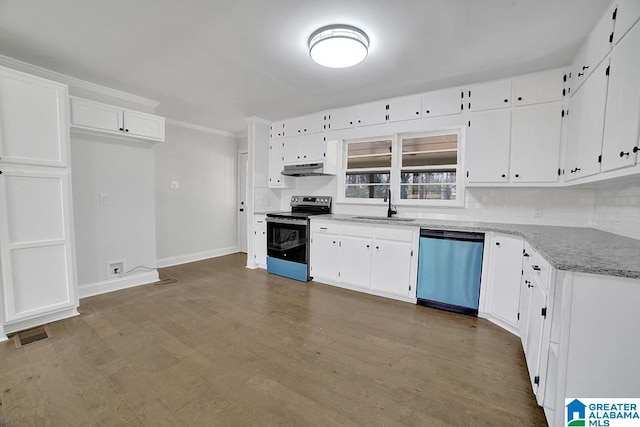 kitchen featuring appliances with stainless steel finishes, white cabinets, and sink