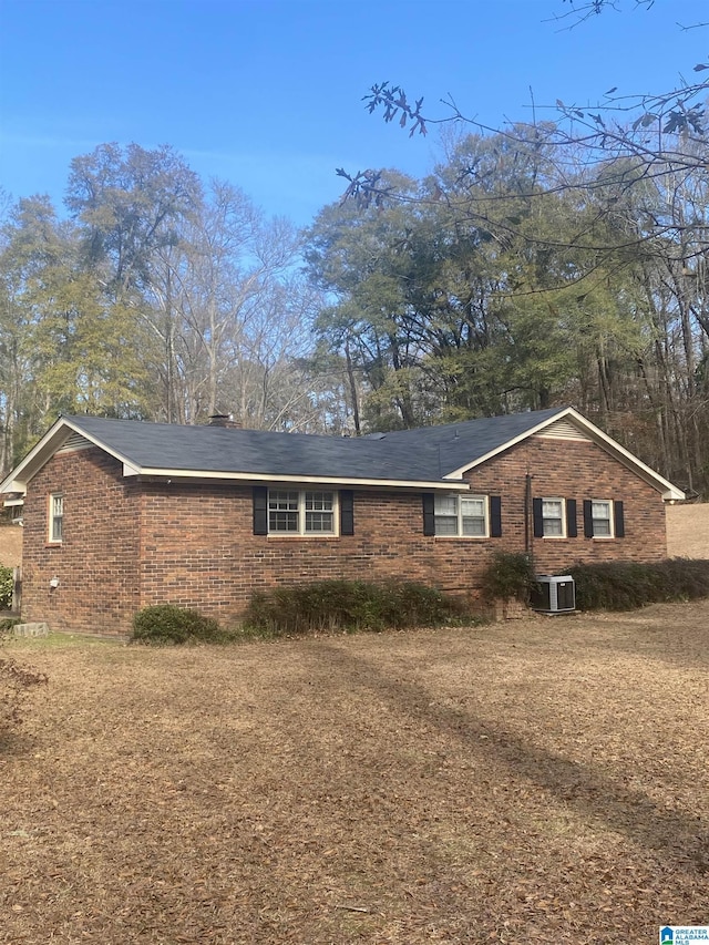 ranch-style home with central AC