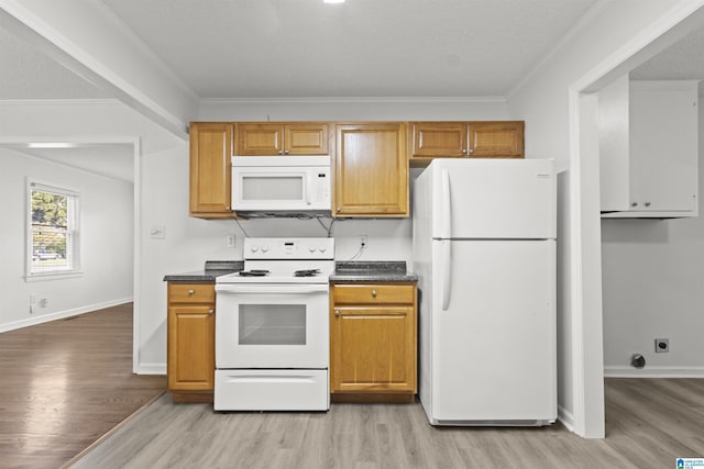 kitchen with white appliances, light hardwood / wood-style floors, and crown molding