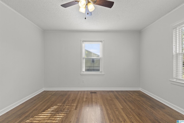 unfurnished room with ceiling fan, dark wood-type flooring, crown molding, and a textured ceiling