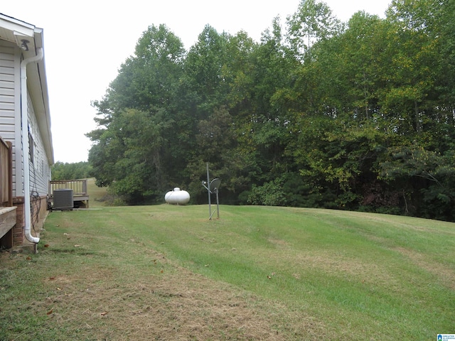 view of yard featuring central AC