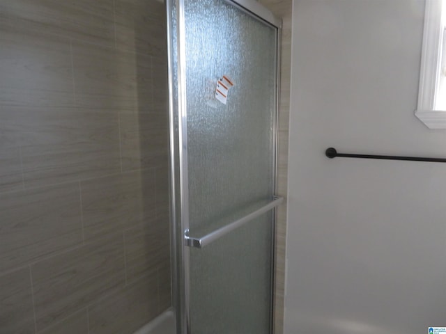 bathroom with an enclosed shower