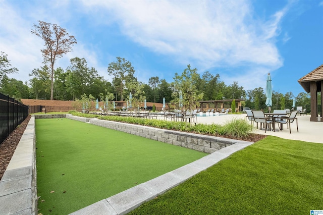 surrounding community with a lawn