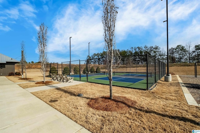 view of sport court featuring tennis court