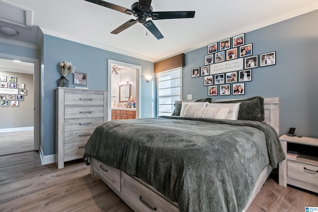 bedroom with ceiling fan, ensuite bathroom, crown molding, and hardwood / wood-style floors