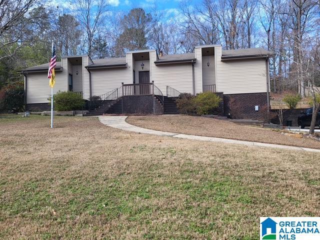 view of front of home with a front yard