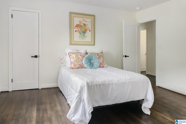 bedroom featuring dark hardwood / wood-style floors