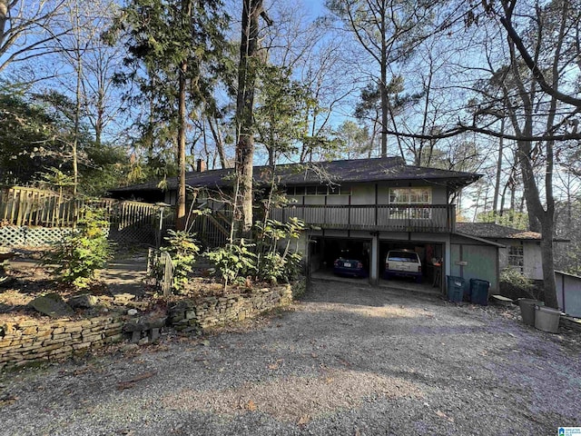 view of front facade featuring a wooden deck