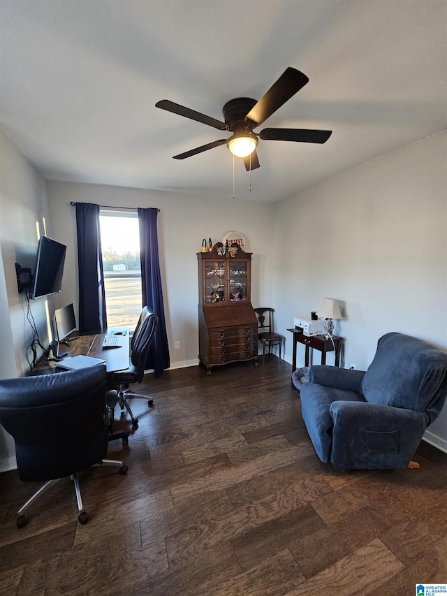 office space with ceiling fan and dark wood-type flooring