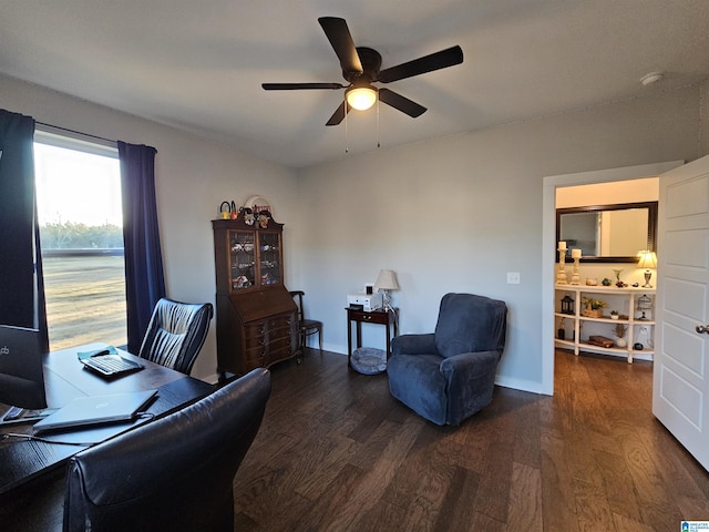 home office featuring ceiling fan and dark hardwood / wood-style flooring