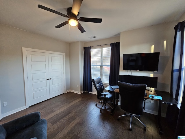 office space featuring ceiling fan and dark hardwood / wood-style floors