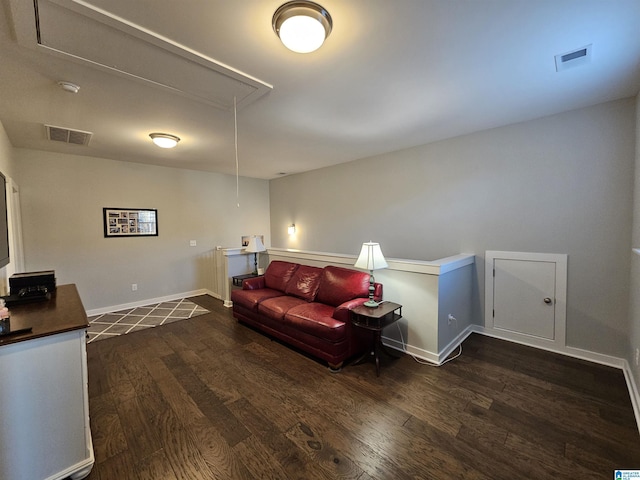 living room featuring dark hardwood / wood-style floors