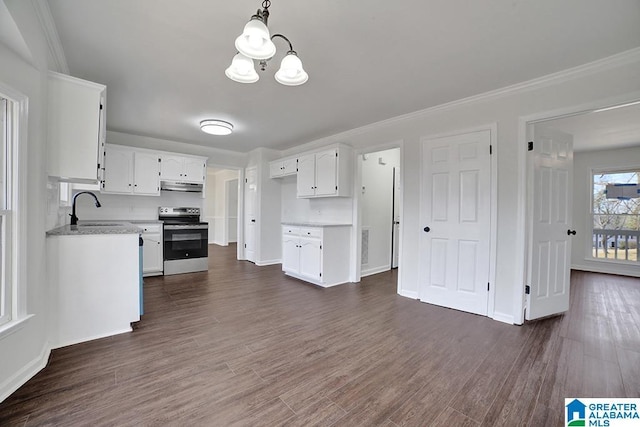 kitchen featuring dark wood-type flooring, decorative light fixtures, stainless steel electric range, white cabinetry, and sink