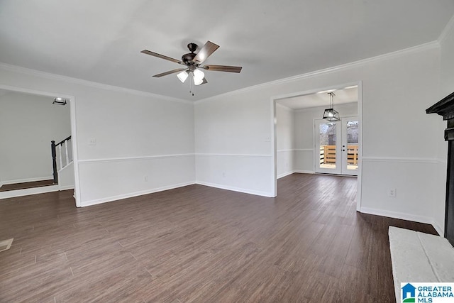 unfurnished living room with ornamental molding, french doors, ceiling fan, and dark hardwood / wood-style floors