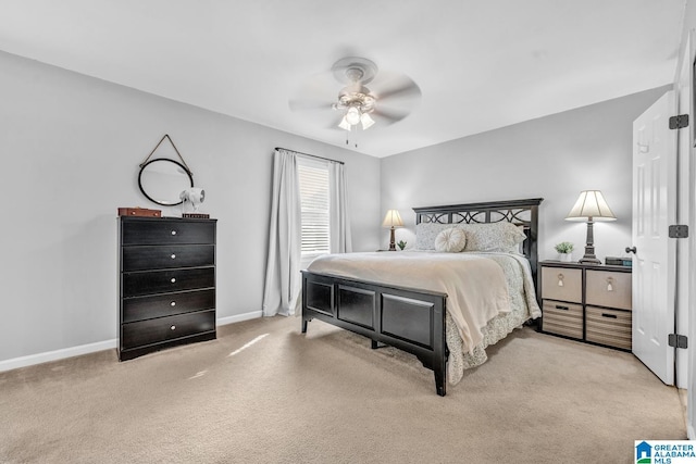 bedroom featuring ceiling fan and light colored carpet