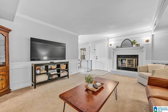 living room featuring light carpet, a fireplace, and ornamental molding