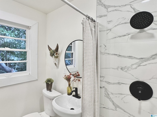 bathroom featuring sink and walk in shower