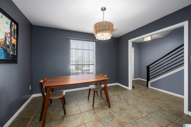 dining area with a chandelier