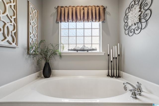 bathroom with a tub