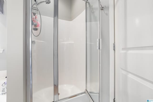 bathroom with an enclosed shower