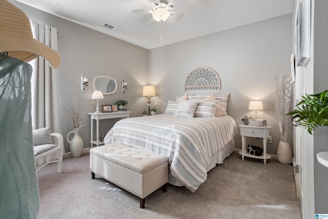 carpeted bedroom featuring ceiling fan